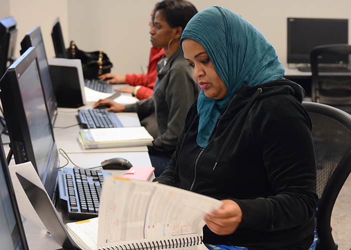 A female medical coding and billing student.