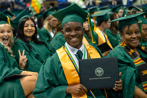 GTCC graduation students smiling at camera