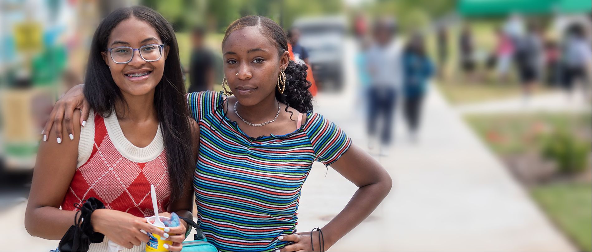 Two female students pose for Welcome Week 2022