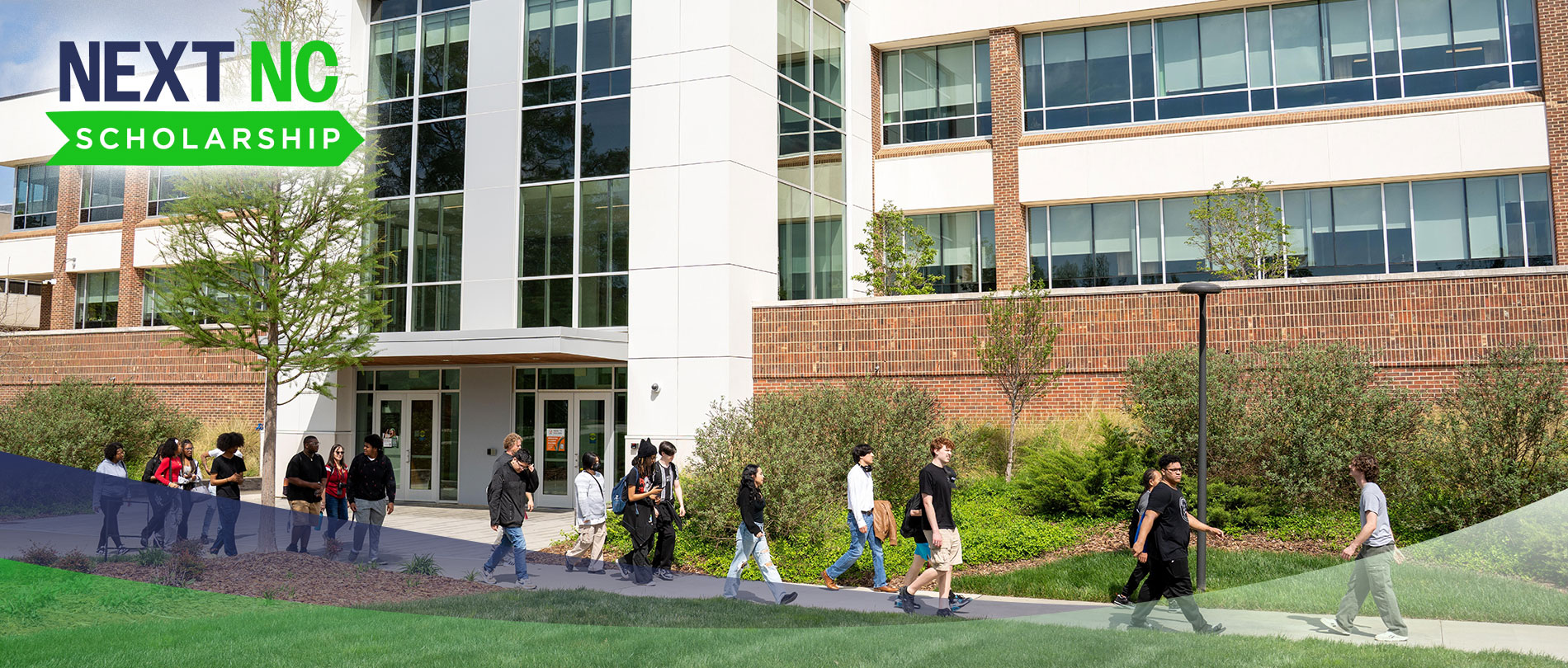 High school students touring GTCC, walking in front of the Medlin building