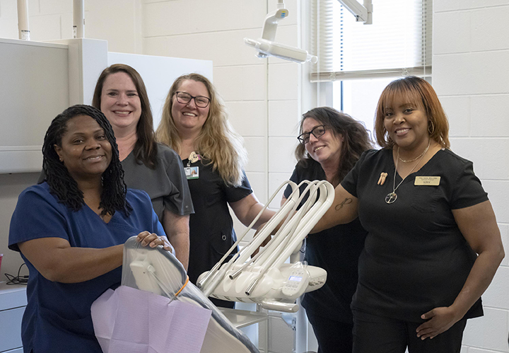 GTCC's dental hygiene instructors (from left) Portia Henderson, Nicole Childress, Brook Hutchins and Laura Lemmer, along with dental assisting instructor Nita Little.